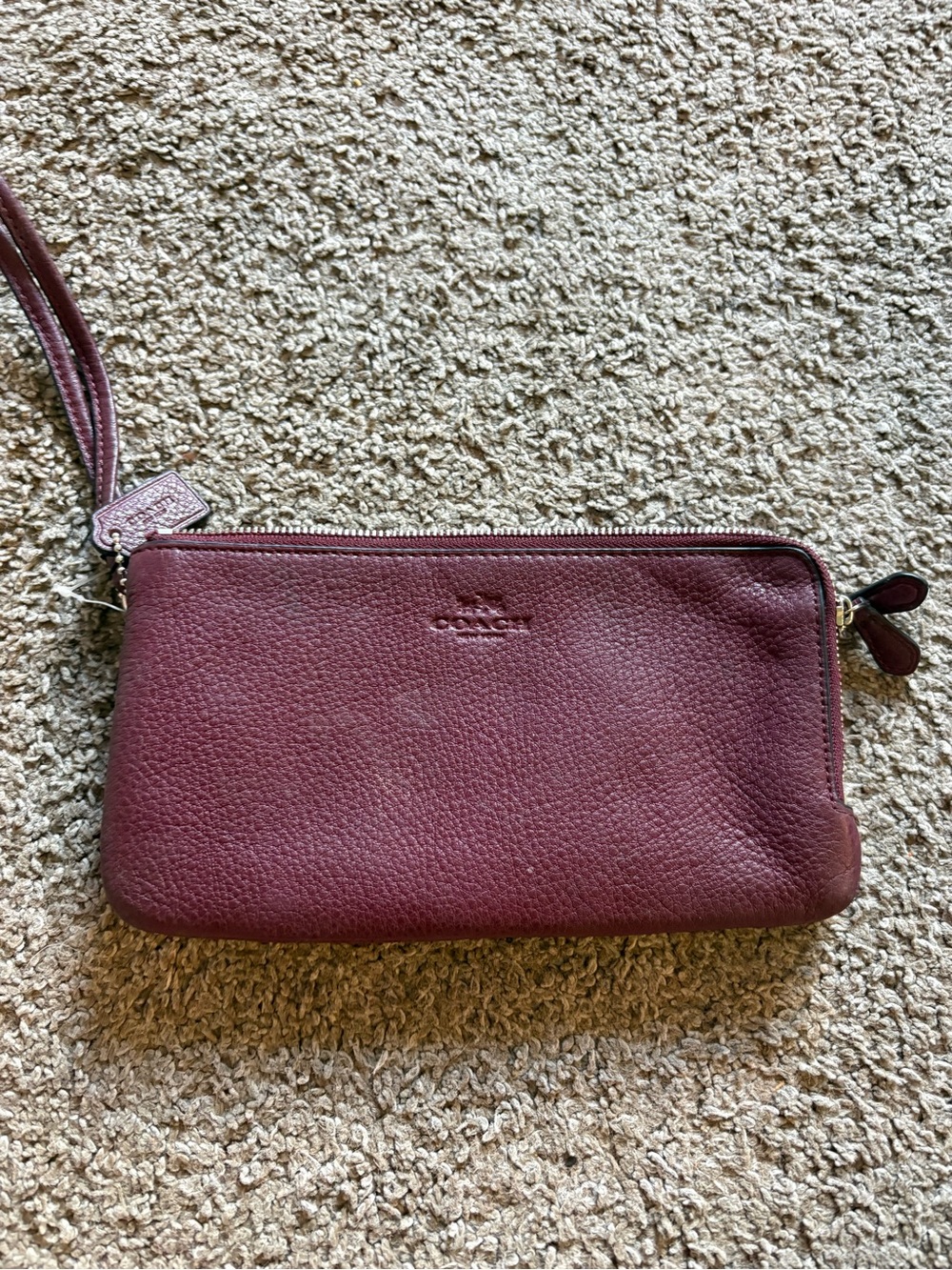 Coach Pebbled Leather Wristlet in Wine